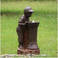 Boy at Water Fountain